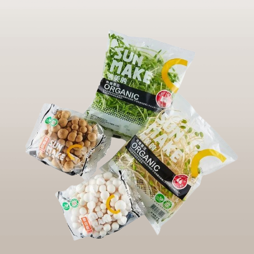 Transparent packaging bag with almonds